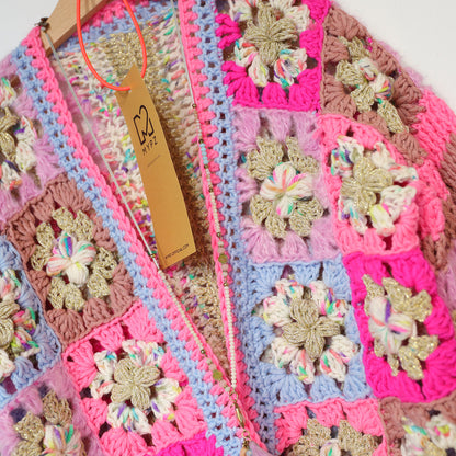 Hækleopskrift - Flowergranny-cardigan Fusion til børn (ENG-NL)